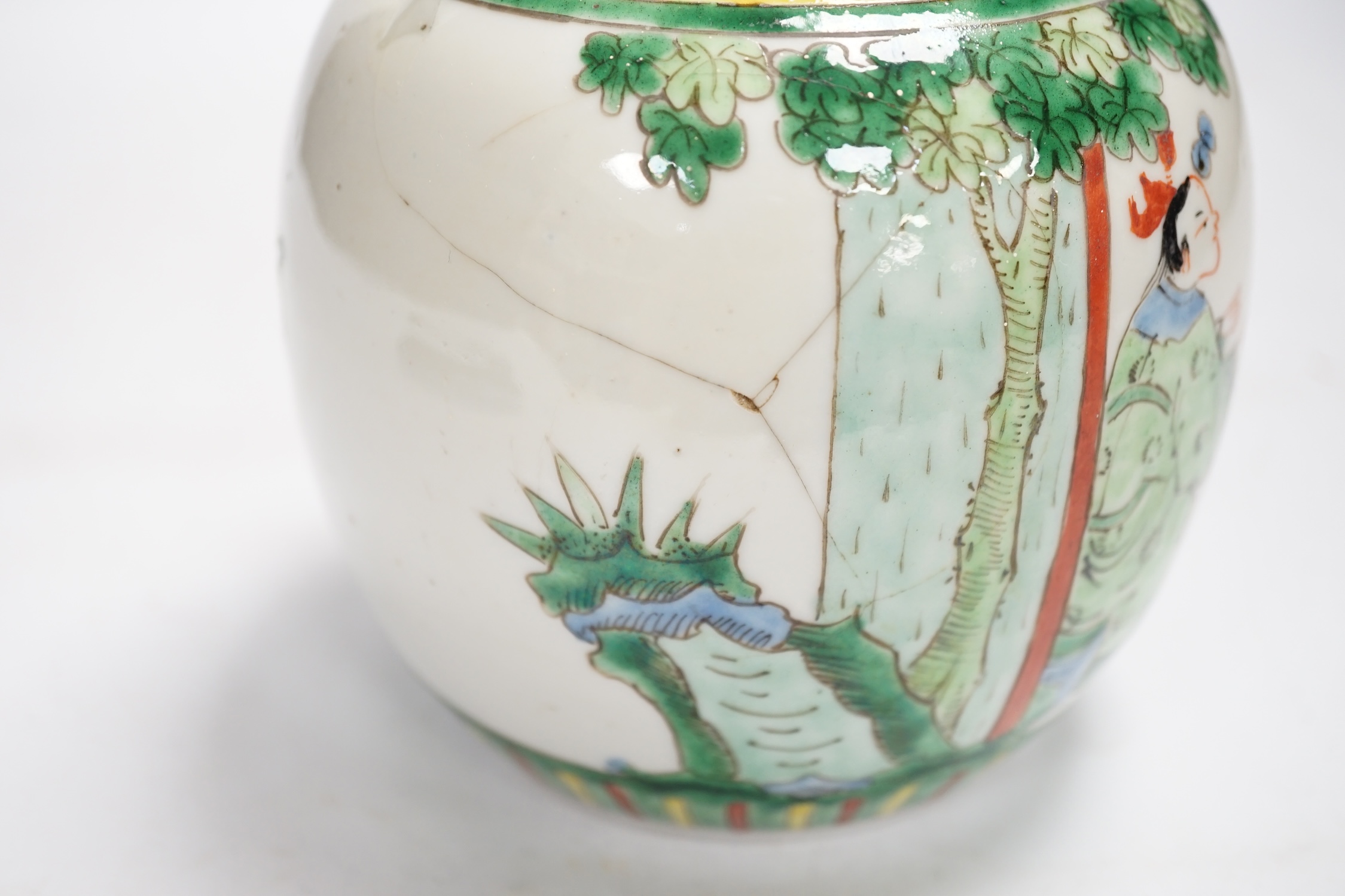 Chinese ceramics to include a crackleware vase and a blue and white vase, a jar and cover and a rice bowl, tallest 20cm high. Condition - all items damaged, overall poor